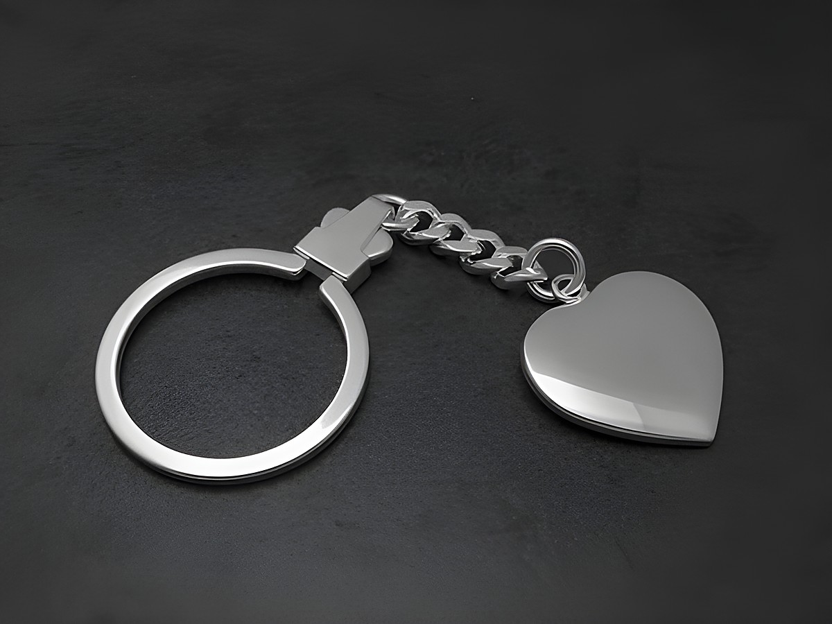 Schlüsselanhänger Herz aus poliertem Sterling Silber, ideal als Geschenkidee, hergestellt von Juwelier Harnisch, echt Silber.
