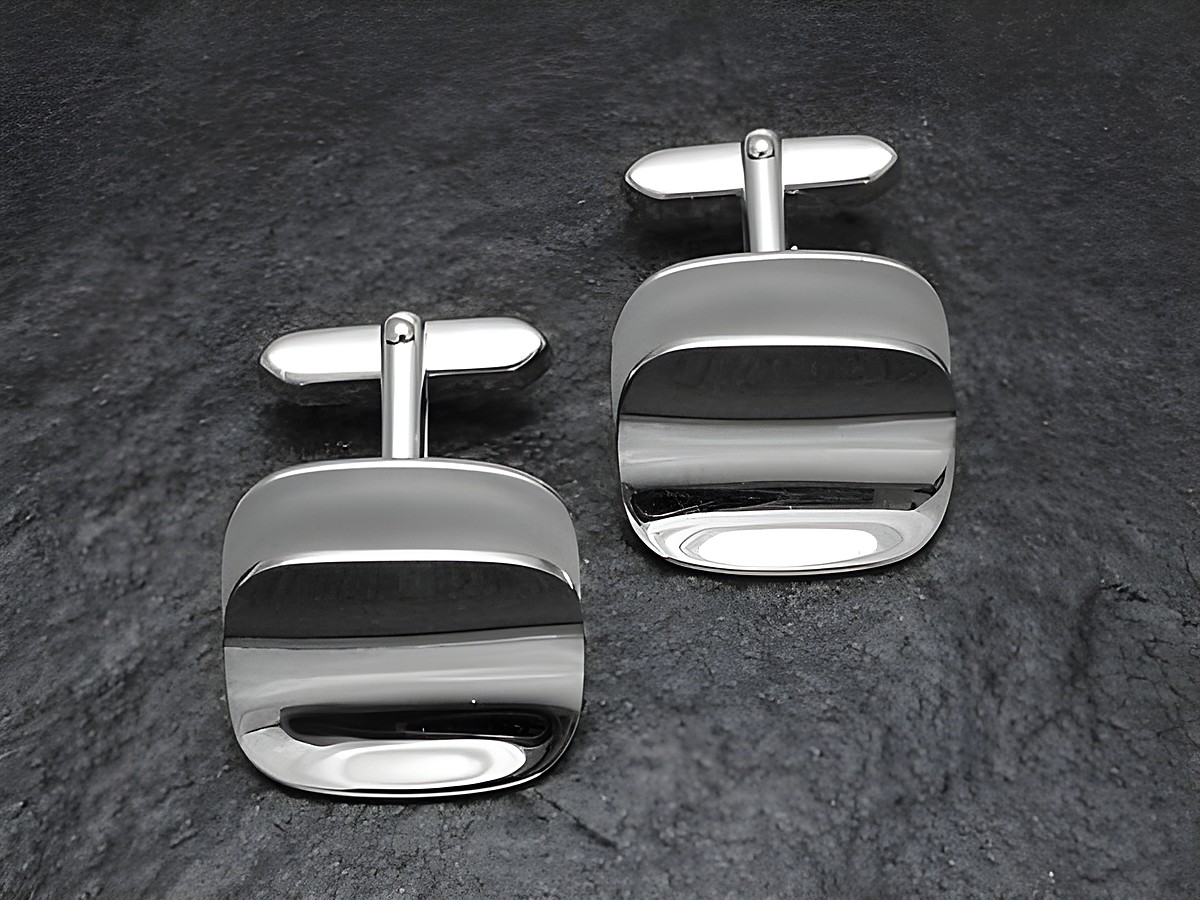 Elegante Manschettenknöpfe in Silber mit modernem Design aus den 70er Jahren, Hersteller Juwelier Harnisch, aus Echt Silber und im neuwertigen Zustand, ideal für stilvolle Anlässe.
