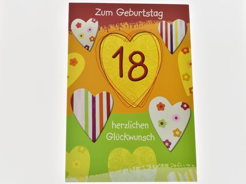 Geburtstagskarte von Juwelier Harnisch mit bunten, herzförmigen Motiven und der Aufschrift Zum Geburtstag 18 herzlichen Glückwunsch auf farbigem Hintergrund.
