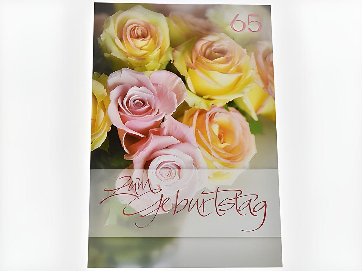 Eine Geburtstagskarte mit rosefarbenen Rosen und einer gelben Rose, dekoriert mit der Aufschrift zum Geburtstag, hergestellt von Juwelier Harnisch.
