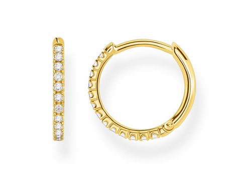Silberne Creolen Ohrringe der Thomas Sabo Charming Collection mit gelbgoldener Beschichtung und klaren Zirkonia-Steinen, elegantes Design für jeden Anlass.