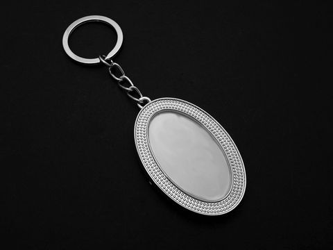 Schlüsselanhänger in ovaler Form mit Fotorahmen, Länge 12 cm, silberfarben, Hersteller Juwelier Harnisch, ideal zur individuellen Gestaltung.