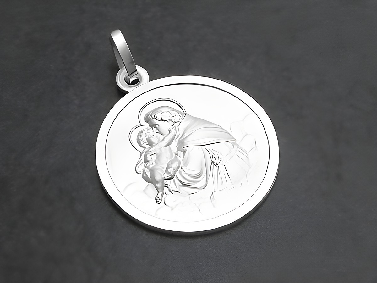 Ein runder Anhänger aus Sterling Silber zeigt den Heiligen Antonius mit dem Jesuskind. Der Anhänger ist detailreich und rund, ideal als Schutzpatron. Hersteller ist Juwelier Harnisch.