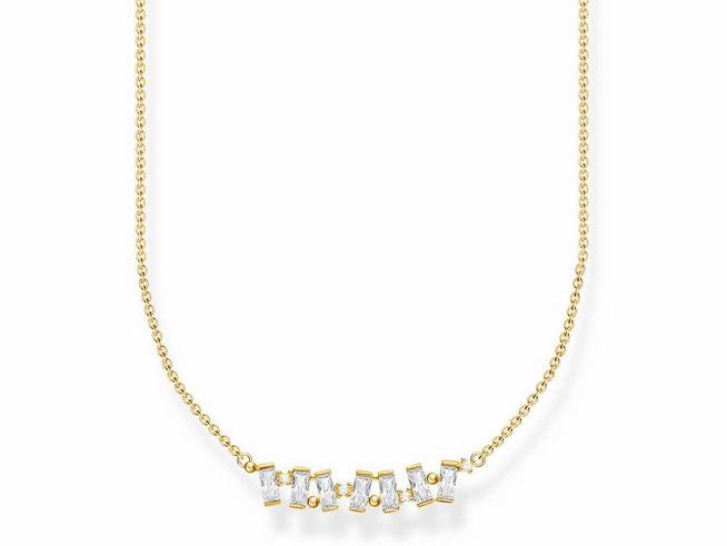 Die Thomas Sabo Charming Kette aus Sterling Silber ist vergoldet und zeigt eine elegante Anordnung von weißen Zirkonia-Steinen, geeignet für eine Länge von 38 bis 45 cm.