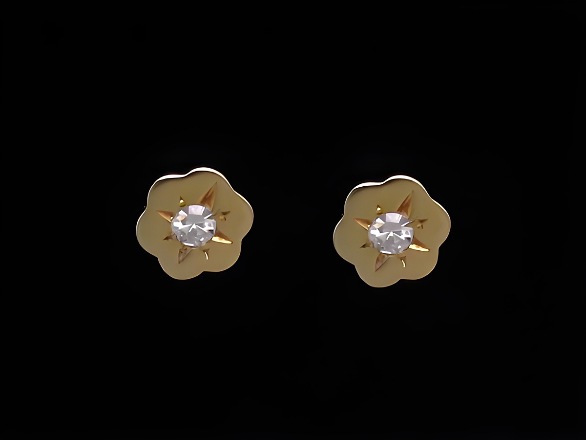 Ohrringe in Blumenform aus Gold mit einem Diamanten von 0,06 ct W/P1, Hersteller Juwelier Harnisch, Brillant & Diamant. Ideal für eleganten Schmuck.