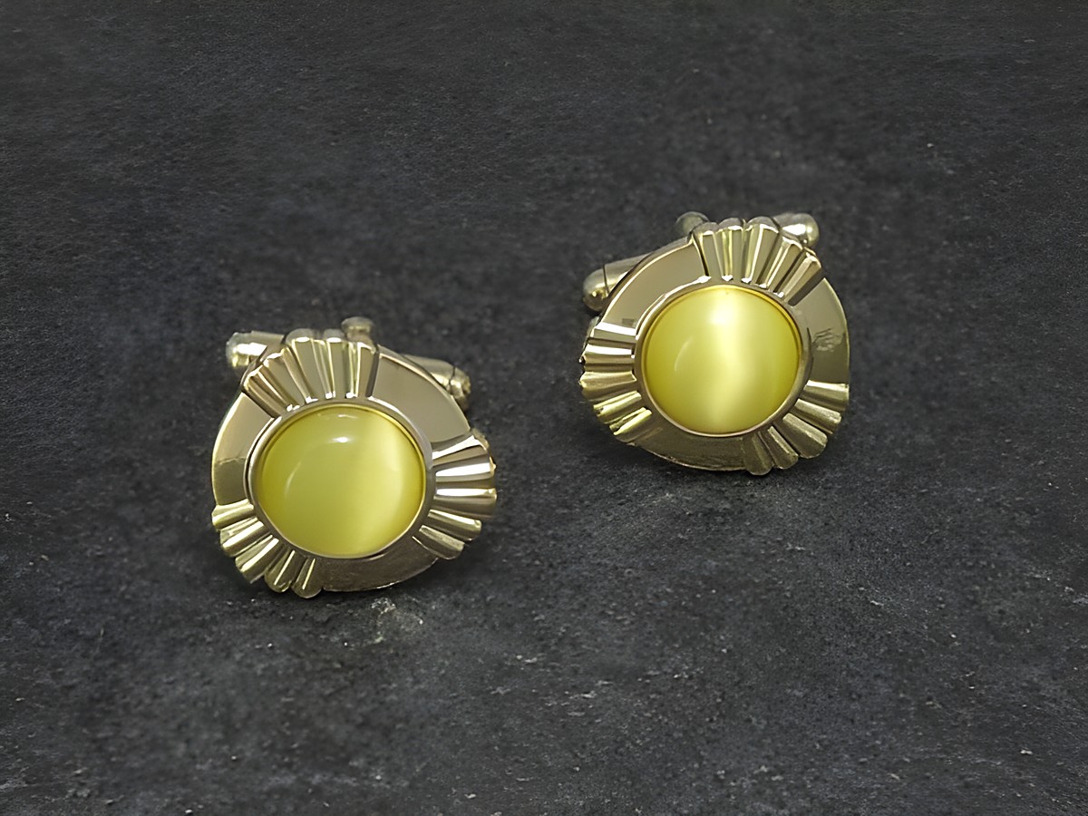Manschettenknöpfe in Gelb mit einem Durchmesser von 18,6 mm, goldfarbenes Design, Hersteller Juwelier Harnisch, elegant und stilvoll für besondere Anlässe.