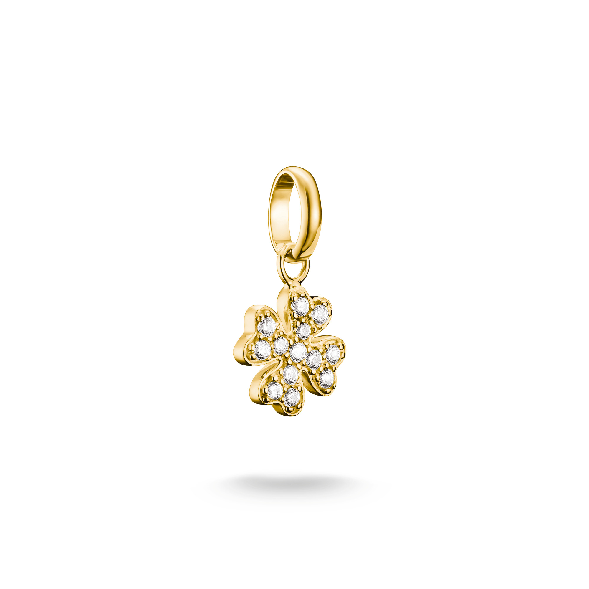 Charm in Form eines Kleeblatts von Thomas Sabo aus vergoldetem Material, besetzt mit weißen Zirkoniasteinen, für einen eleganten und glücksbringenden Akzent. Neuheit im Sortiment.