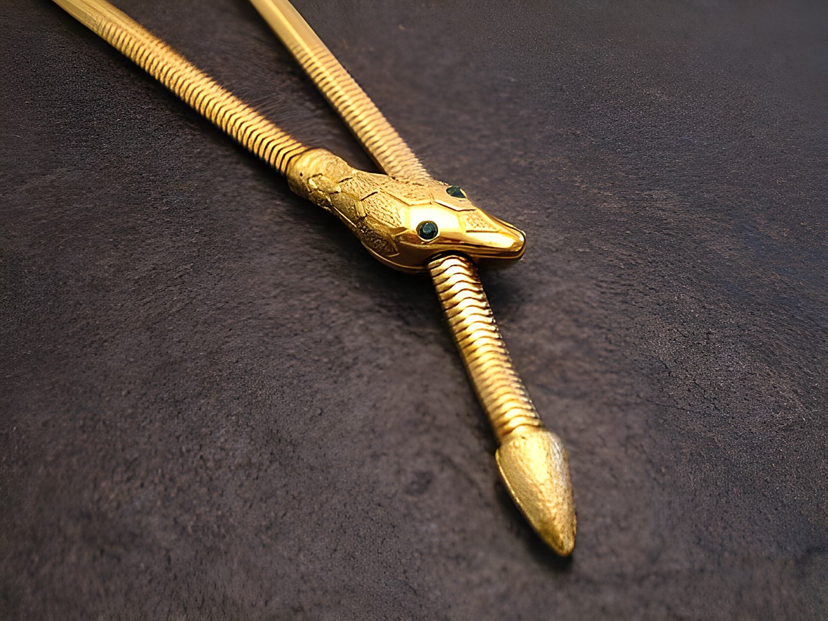 Schlangen Y Kette gut vergoldet 62 cm City Grün Hersteller Juwelier Harnisch Schlangen, elegante Kette mit Schlangendesign und funkelnden Details.