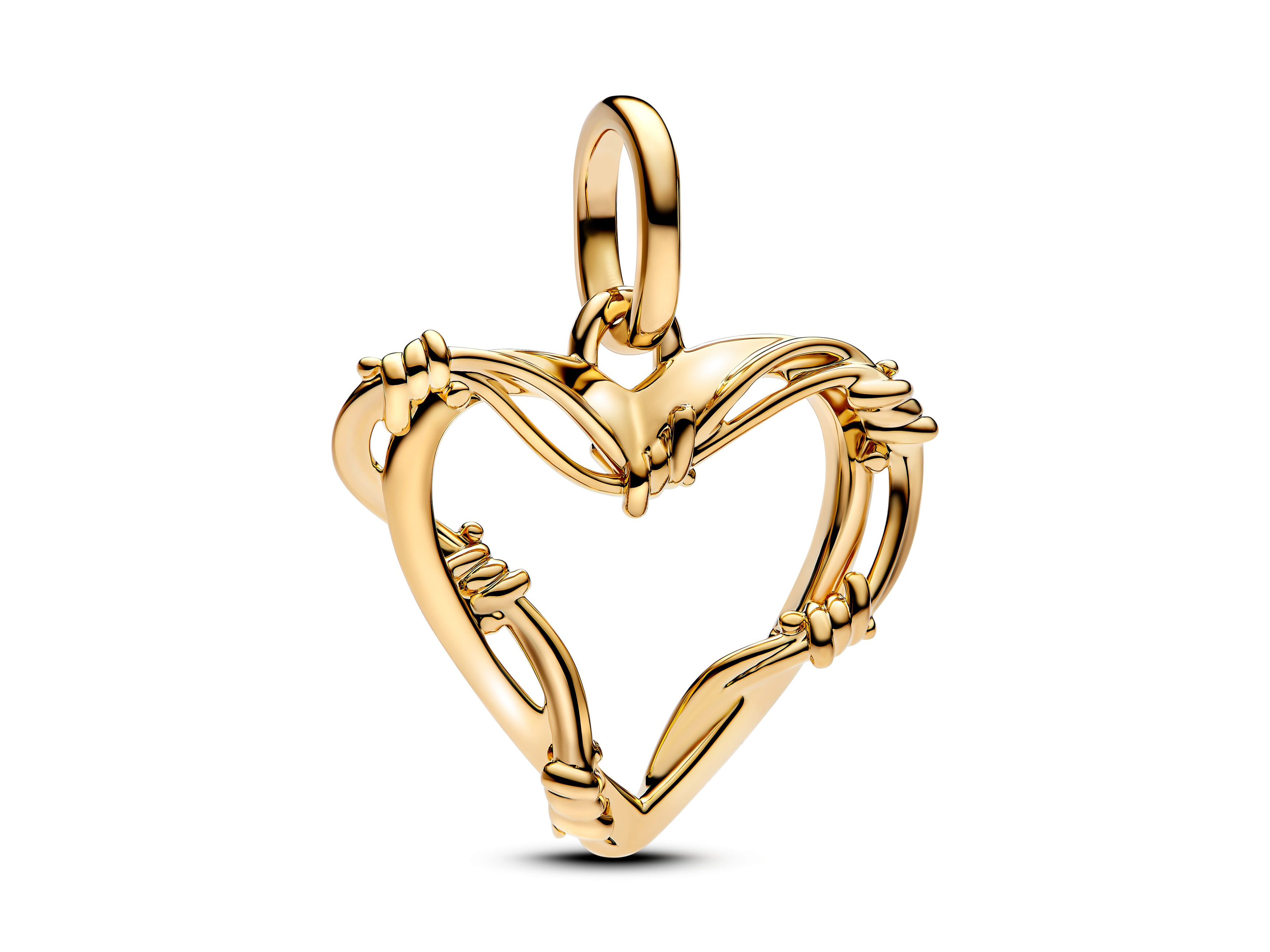 Ein filigranes Herz aus gelbgold vergoldetem Metall, kunstvoll mit Stacheldraht-Elementen designt, verleiht diesem Charm von Pandora ME einen einzigartigen, modernen Look.