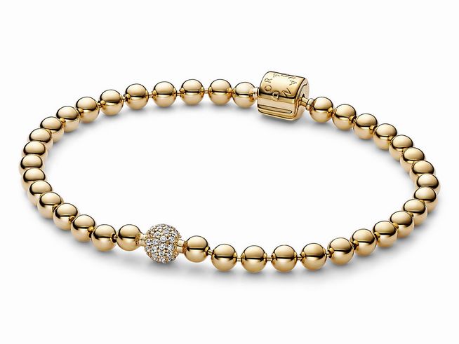 Kugeln und Pavé Armband von Pandora in Gelbgold Vergoldung mit Zirkonia, eine elegante 17 cm lange Schmuckstück mit funkelndem Detail. Ideal für jeden Anlass.
