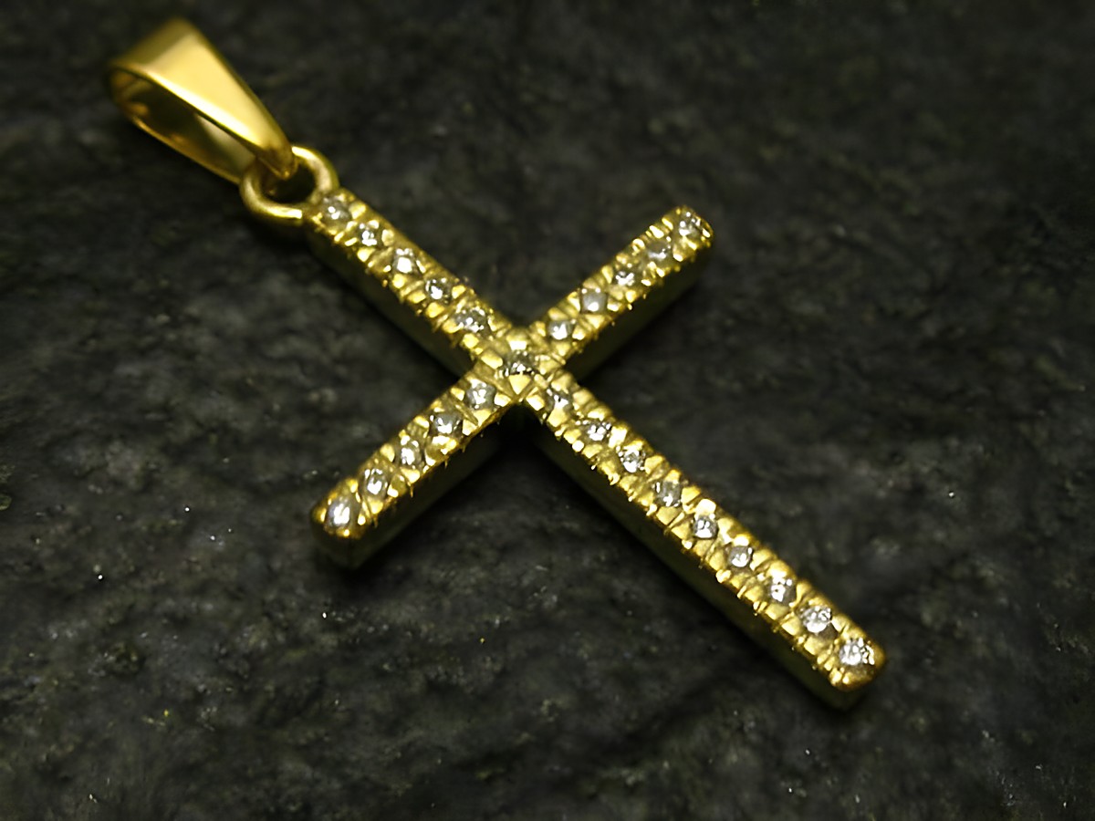Kleines Diamant Kreuz mit 17 Diamanten in Gold 585, Hersteller Juwelier Harnisch, hochwertig gearbeitet, glänzende Oberfläche und edles Design. Ideal als Schmuckstück für besondere Anlässe.