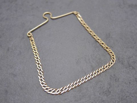 Doppelpanzerkette Krawattenhalter aus Gelbgold 333 von Juwelier Harnisch, elegante Krawattenklammer für stilvolle Akzente und sicheren Halt.