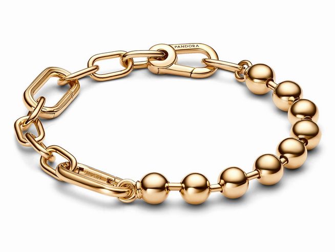 Ein elegantes Kugel- und Gliederarmband von Pandora in Gelbgold Vergoldung mit einer Länge von 15 cm, zeigt eine harmonische Kombination aus runden Perlen und Gliedern.