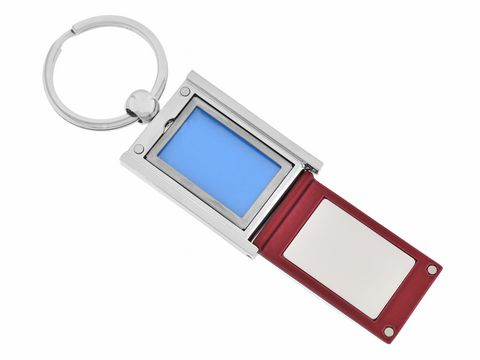 Rechteckiger Medaillon Schlüsselanhänger aus Edelstahl, 8,3 cm groß, zum Aufklappen mit Platz für Gravuren, von Juwelier Harnisch, farbige Innenansicht in Blau.