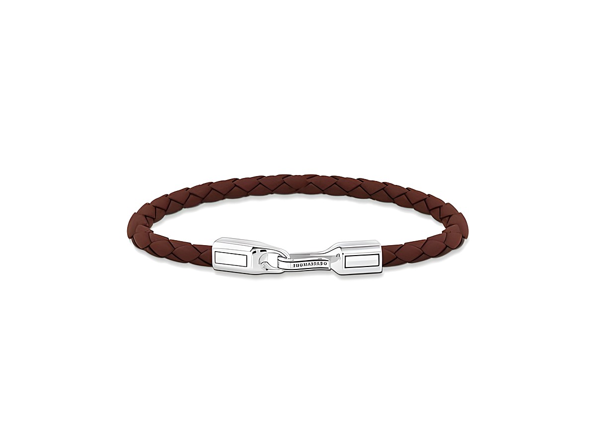 Silbernes Armband von Thomas Sabo mit geflochtenem, braunem Leder und einem schlichten Verschluss in Silber, ideal für einen eleganten und zeitlosen Look.