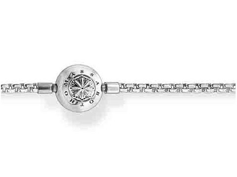 Fußkettchen von Thomas Sabo aus Silber mit einem zentralen, runden Anhänger, dekoriert mit einem funkelnden Stein. Länge 26 cm, geeignet für elegante Fußschmuck-Looks.