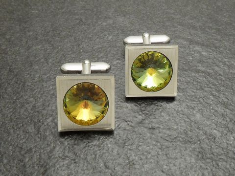 Strass Manschettenknöpfe als Einzelstück in Gelb und rund, hergestellt von Juwelier Harnisch, mit funkelnden Strass Steinen, stilvoll und elegant für besondere Anlässe.