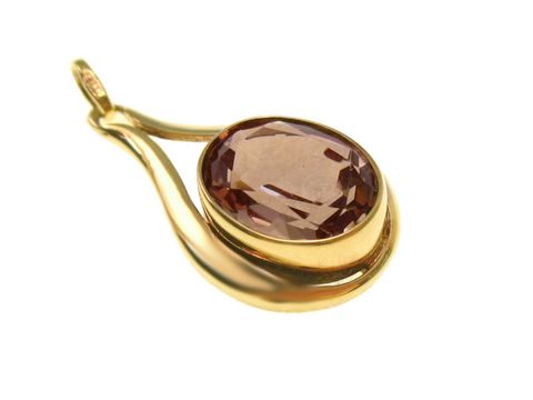 45167-0 Rauchquarz hell Gold Anhänger mit ovalem, facettiertem Rauchquarz von 21 mm, gefasst in einem eleganten goldenen Design, Hersteller Juwelier Harnisch.