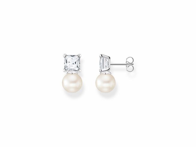 Ohrstecker aus Sterling Silber von Thomas Sabo mit einer Süßwasserzuchtperle und Zirkonia. Elegantes Design mit funkelnden Steinen und einer klassischen Perle. Perfekt für jeden Anlass.