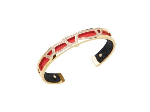 26001271-0 Ein eleganter Armreif von Les Georgettes in Gold mit einem auffälligen Design aus rotem und schwarzem Elementen, Modell 7032742 GIRAFE, 8 mm breit. Ideal für stilvolle Akzente.
