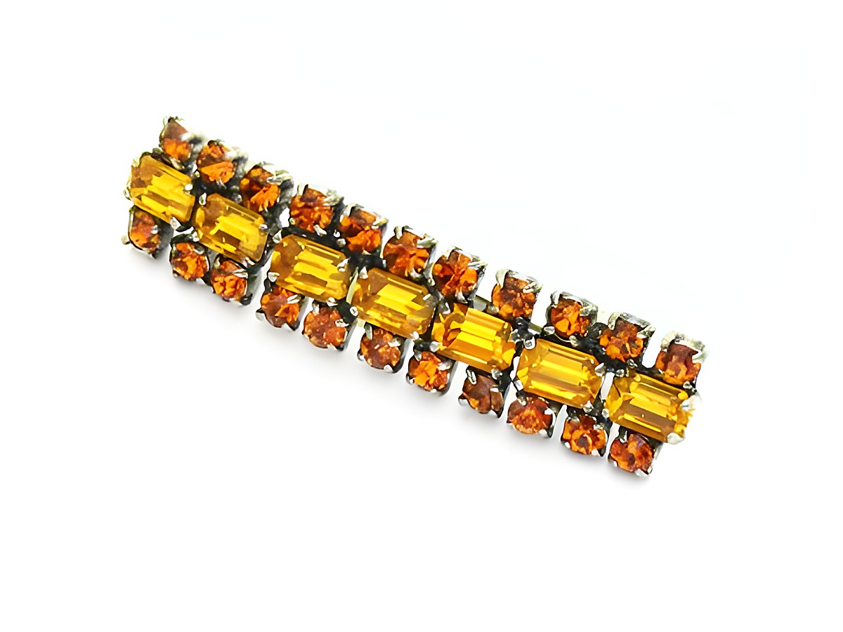 Strass Brosche -Eckig- Orange & Gefasst. -NEU-, Hersteller: Juwelier Harnisch, Strass Brosche Gelb - Braun, leuchtende Steine in ockerorangen und braunen Farbtönen, stilvolles Design.