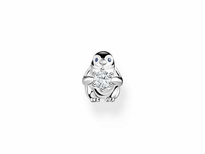 Ohrstecker in Form eines Pinguins aus Sterling Silber mit Kaltemail und Zirkonia, das Tier hält einen funkelnden Stein in den Händen, ideal als einzelnes Schmuckstück von Thomas Sabo.