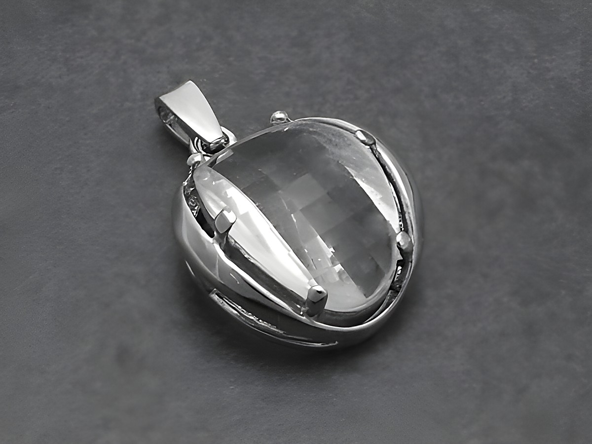 Silber Anhänger rhodiniert 17x13mm mit ovalem Bergkristall, Hersteller Juwelier Harnisch, schlichtes Design mit klarer Kristalloberfläche. Ideal für eleganten Schmuck.