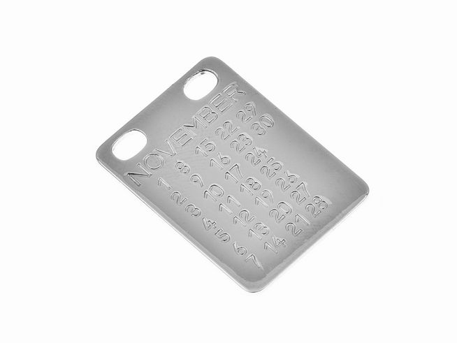 Gravurplatte für das Sternzeichen November mit den Datumsangaben 1 bis 30, aus hochwertigem Edelstahl, hergestellt von Juwelier Harnisch, als individuelles Geschenk.