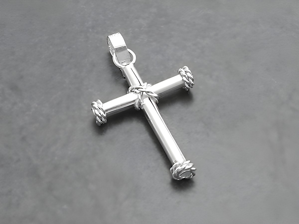 Silberner Kreuz-Anhänger aus gedrehtem Draht, schlicht und elegant, Hersteller Juwelier Harnisch, ideal für puristische Schmuckliebhaber.