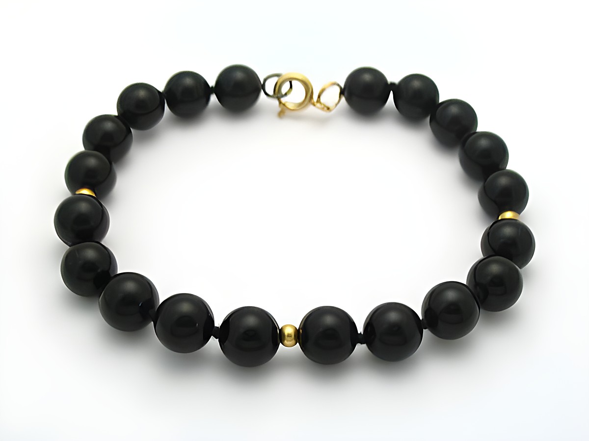 Perlen Onyx Armband 20 cm goldfarben, Hersteller Juwelier Harnisch, Armband mit Edelsteinen aus schwarzen Onyxperlen und goldenen Akzenten.