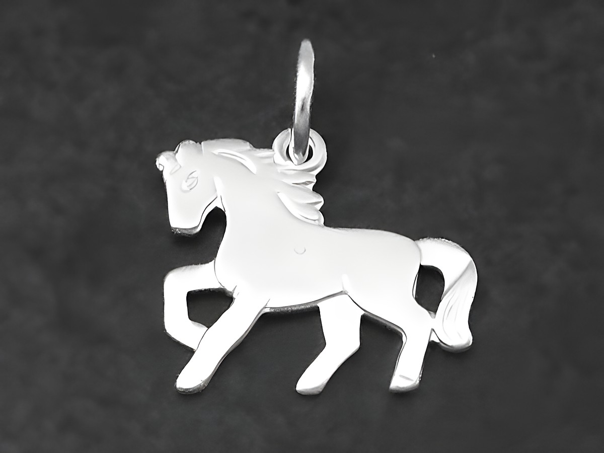 Ein süßer polierter Silber Anhänger in Form eines Ponys, Hersteller: Juwelier Harnisch, ideal für Tierliebhaber.