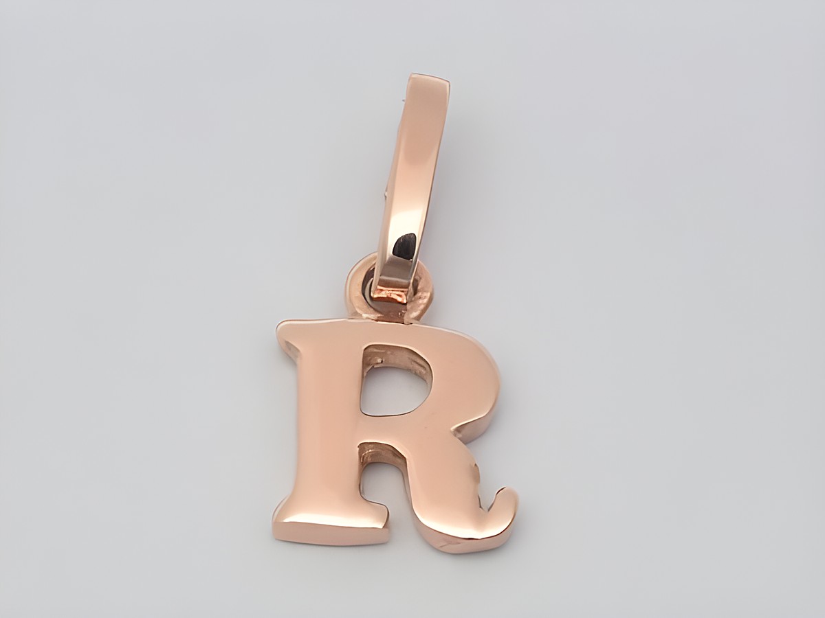 Buchstaben Anhänger R aus 925 Sterling Silber rosé vergoldet, hergestellt von Juwelier Harnisch, ideal als personalisiertes Schmuckstück.
