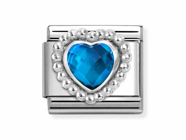 Silberne Herz Kugelfassung mit einer facettierten blauen Steinkampagne von Nomination, umgeben von einer Perlenstruktur, elegant und stilvoll, perfekt für elegante Schmuckstücke.
