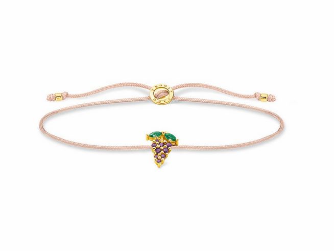 Thomas Sabo Armband LS127-472-7-L20V aus vergoldetem Sterling Silber mit buntem Glas-Keramik Stein und Nylonband, verziert mit einem Anhänger in Traubenform.