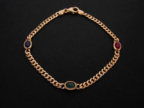 Goldenes Armband Panzer 6 x 3,8 mm aus Gold 585 mit Rubin, Smaragd und Safir, Länge 19,5 cm, Hersteller Juwelier Harnisch, elegantes und hochwertiges Schmuckstück.