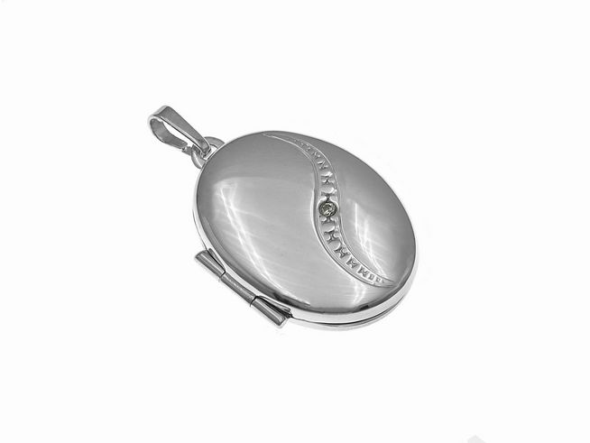 Medaillon oval aus rhodiniertem Sterling Silber mit Zirkonia, elegant und zeitlos, Hersteller Juwelier Harnisch, ideal für persönliche Erinnerungen oder als Geschenk.
