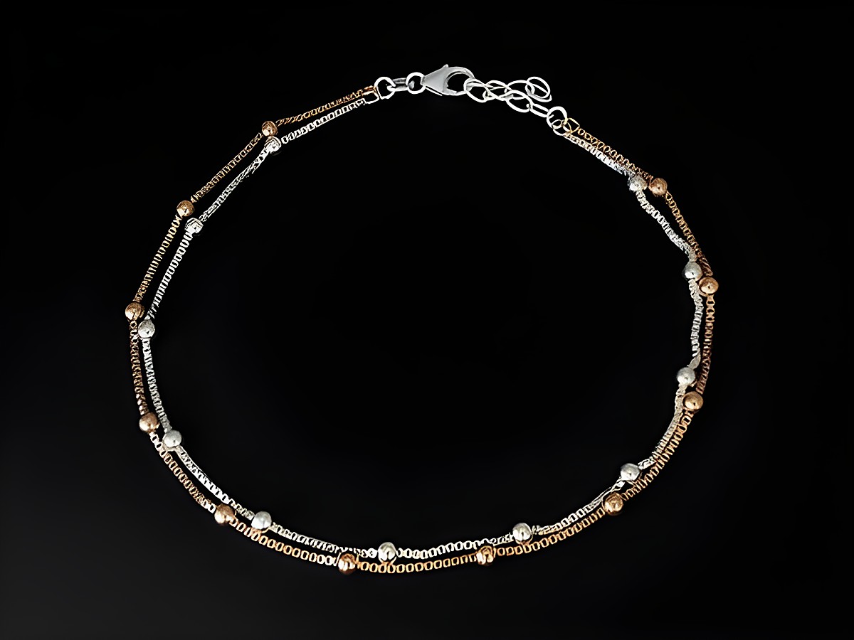 Elegantes Fußkettchen Venezia mit Kügelchen aus Silber rosé teilvergoldet, verstellbar von 23 bis 26 cm, hergestellt von Juwelier Harnisch, klassisches Design.
