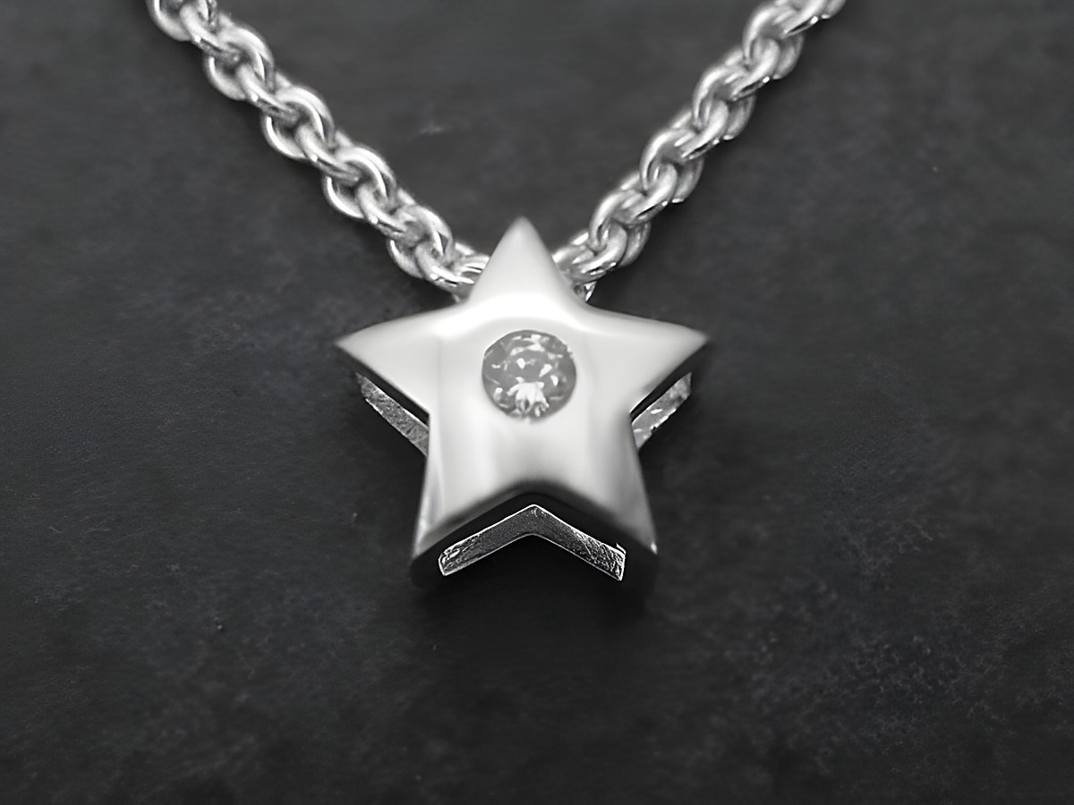 Stern Silber Anhänger aus Sterling Silber mit Zirkonia auf einer Kette, Hersteller Juwelier Harnisch, inspiriert von Sonne Mond Sterne. Elegant und funkelnd, ideales Schmuckstück.
