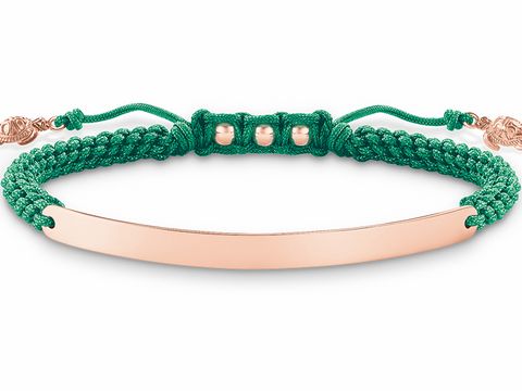 Makramee Armband von Thomas Sabo in grünem Nylon mit roségoldener, glatter Plakette und eleganten Details, geeignet für Handgelenke von 15 bis 21 cm.
