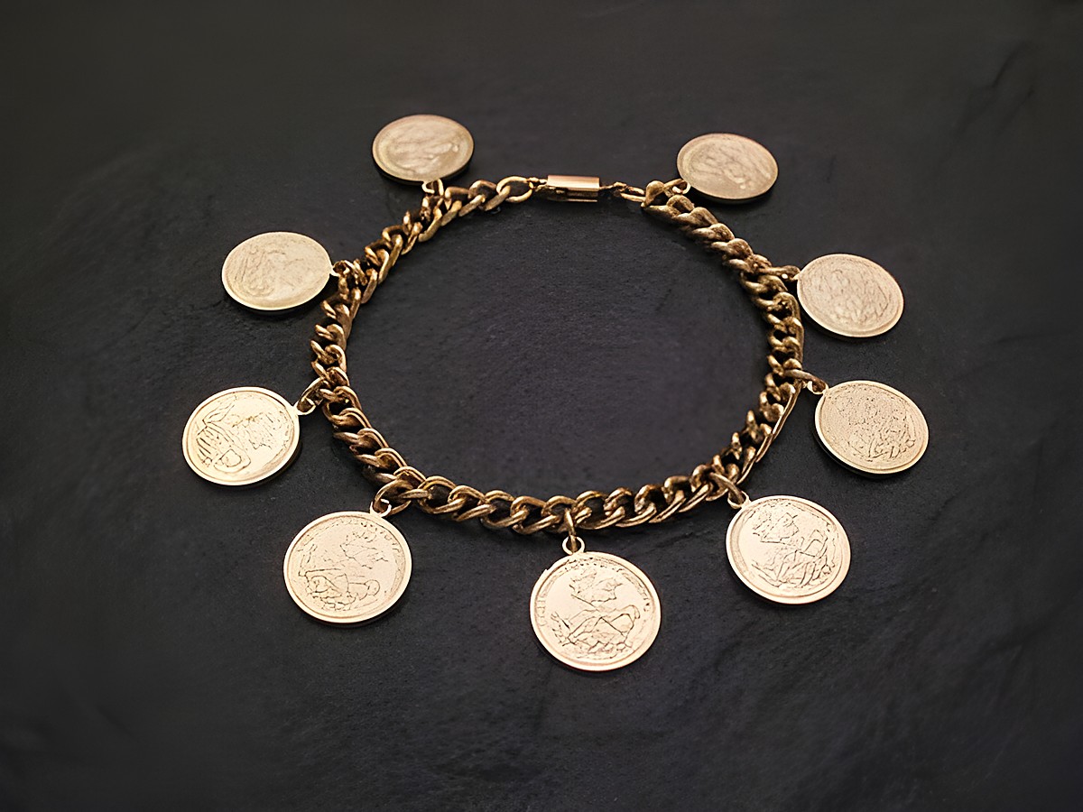 Armband goldfarben mit Münzoptik, Hersteller Juwelier Harnisch, aus massivem Material mit mehreren charmanten Münzanhängern, ideal für eleganten und modischen Schmuck.