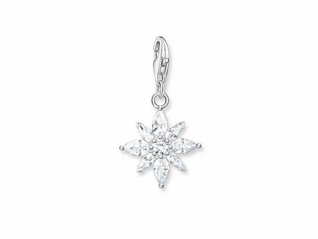 Thomas Sabo Charms-Anhänger in Form einer Blume aus Sterling Silber mit weißen Zirkonia. Der Anhänger hat eine anhängende Öse und strahlt eleganten Glanz aus.