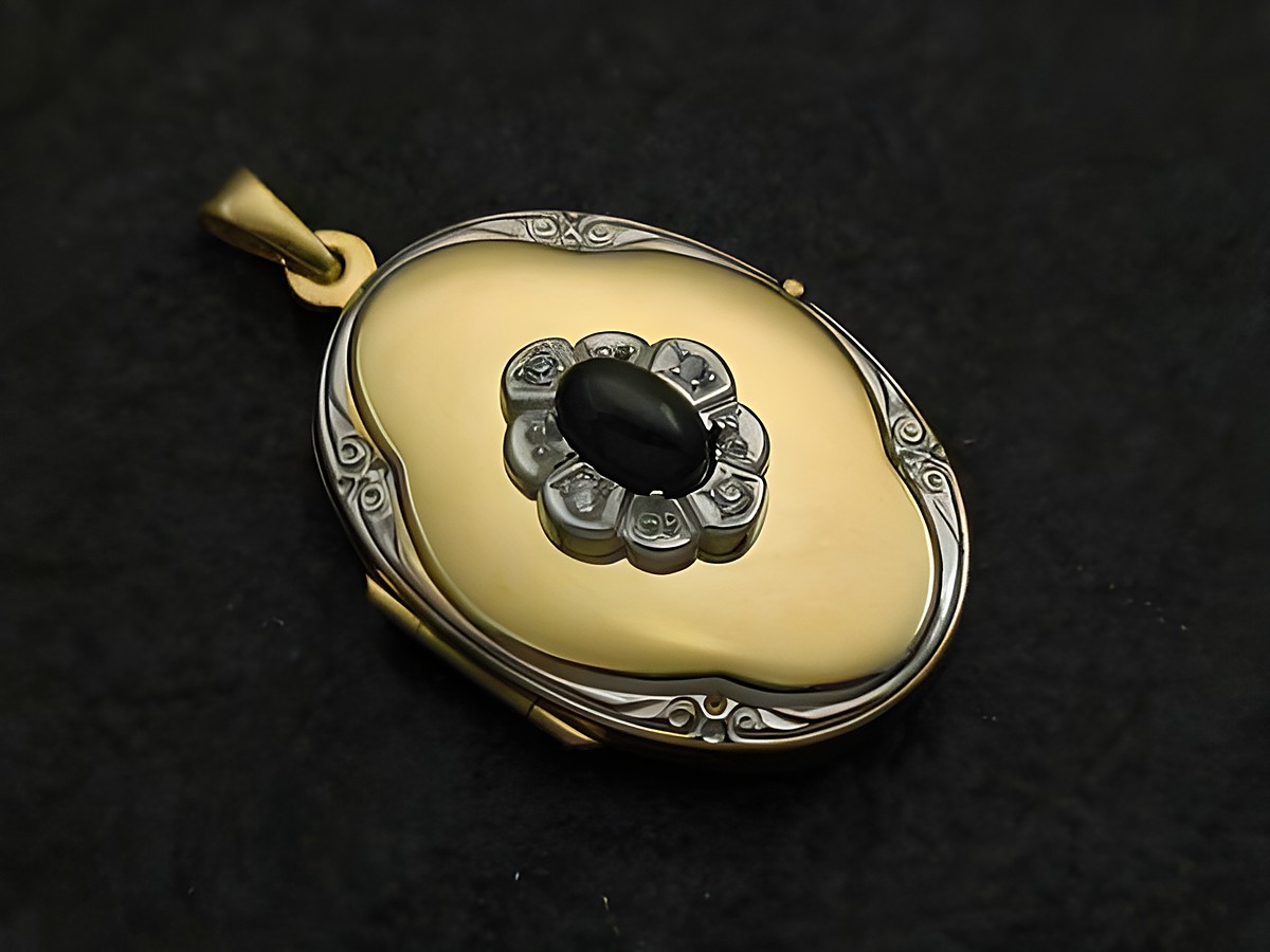 Ein schwarzes Diopsid Medaillon in Cabochon-Schliff, umgeben von Gold 585 bicolor und Brillanten, hergestellt von Juwelier Harnisch aus Gelbgold 585.