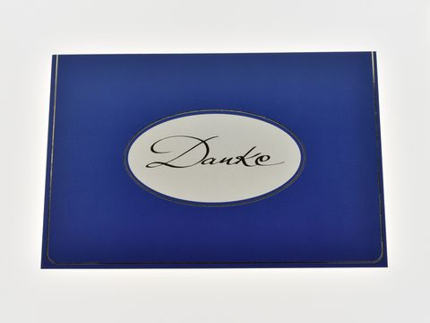 Blau gestaltete Dankeskarte mit goldener Schrift auf weißem Oval. Hersteller Juwelier Harnisch. Elegantes Design für verschiedene Anlässe.