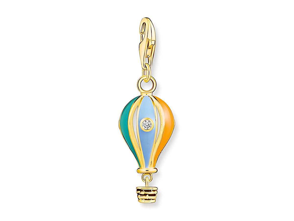 Charm-Anhänger von Thomas Sabo in Form eines Heißluftballons aus silber vergoldetem Gelbgold mit buntem Emaille und einem funkelnden Stein in der Mitte.