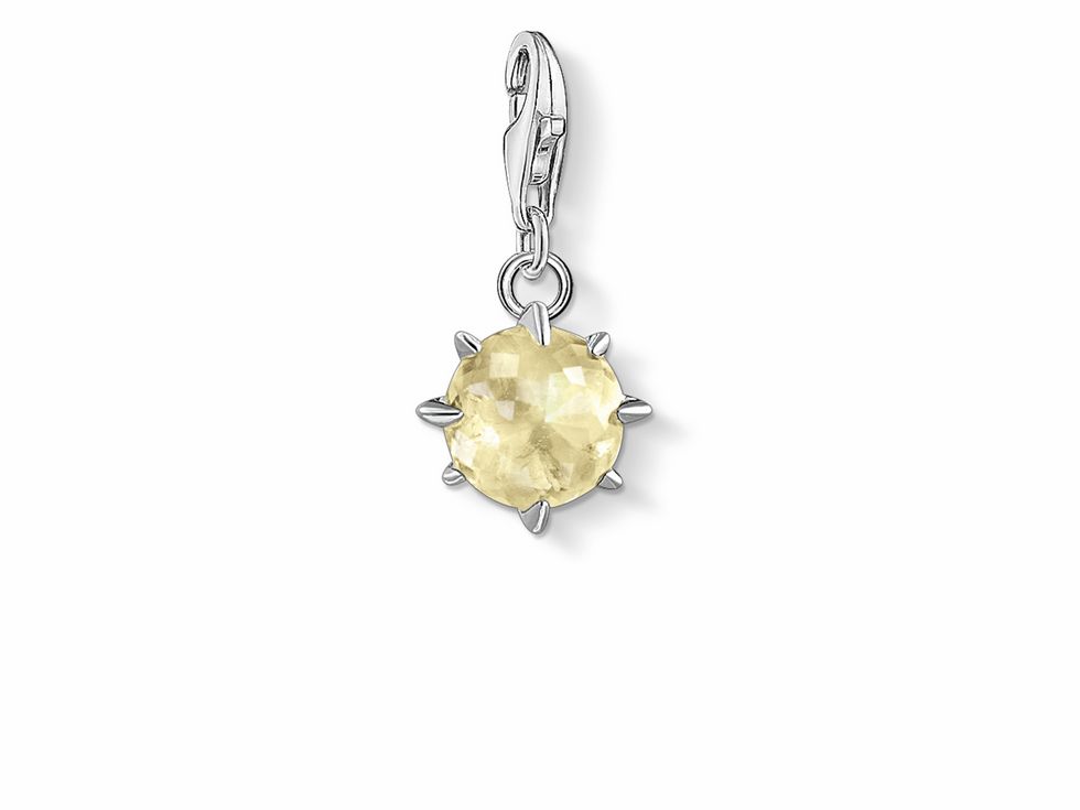 Charm-Anhänger von Thomas Sabo, Modell 1783-774-4, in gelber Farbe, als Geburtsstein für November, mit facettiertem Stein und spitzen Akzenten, aus hochwertigem Material gefertigt.