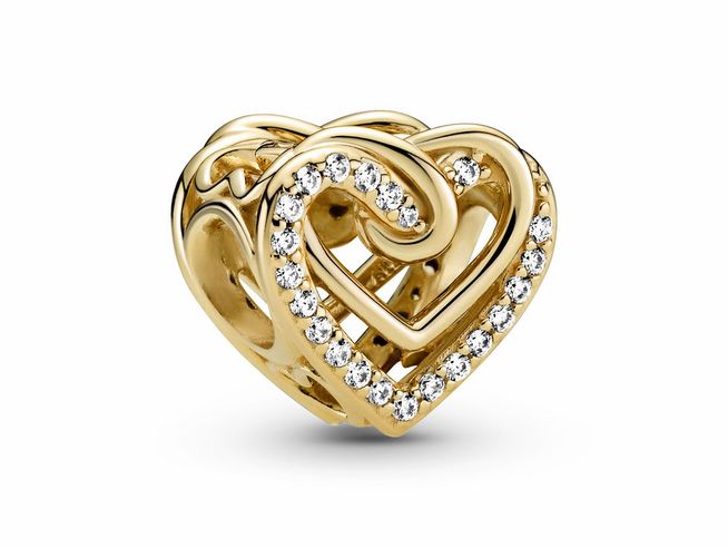 769270000-0 Ein charmantes, doppelt geschlungenes Herz aus gelbgold vergoldetem Metall mit funkelnden Zirkonia-Steinen umrandet, hergestellt von Pandora, Modell SHINE.