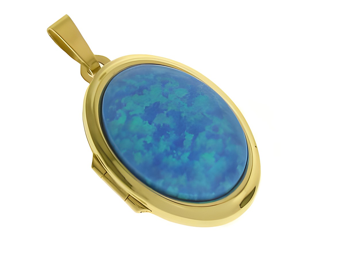 Medaillon mit hellblauem Opal Cabochon in ovaler Form, umrahmt von glänzendem Gold 333, gefertigt vom Juwelier Harnisch, elegantes Schmuckstück für besondere Anlässe.