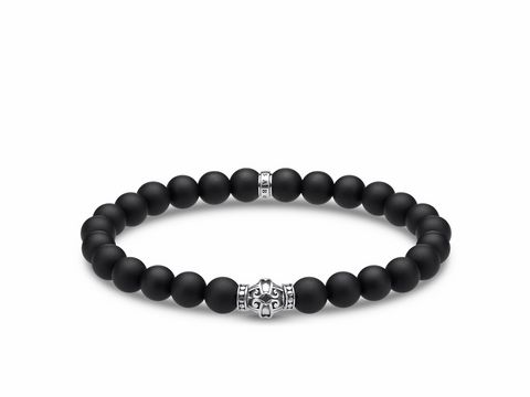 Silbernes Thomas Sabo Armband A1942-704-11-L19 mit schwarzen Mattperlen und dekorativem silbernen Element, Gesamtlänge 19 cm, geeignet für Handgelenke bis 20 cm.
