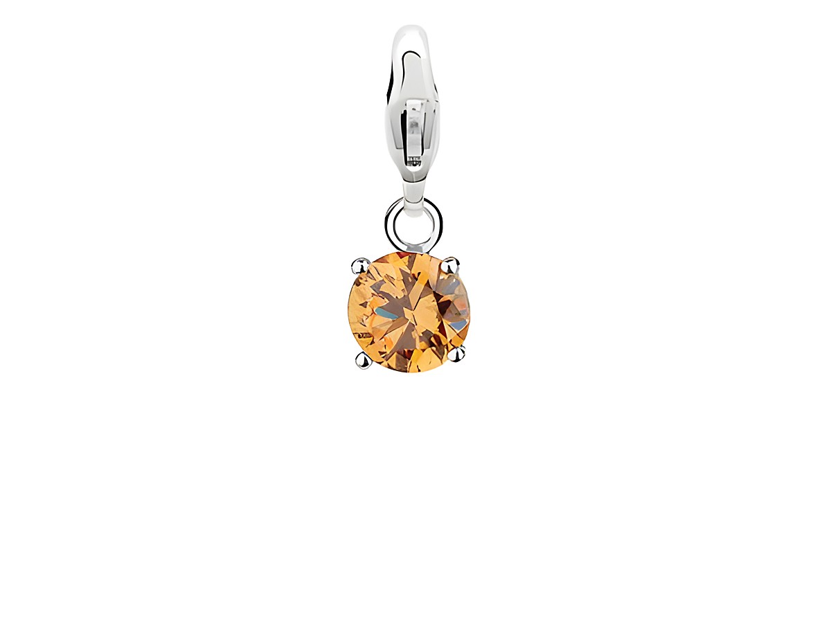 Der charm zeigt einen funkelnden, goldenen Kristall in runder Form, der an einem silbernen Clip befestigt ist und ideal für eleganten Schmuck geeignet ist.
