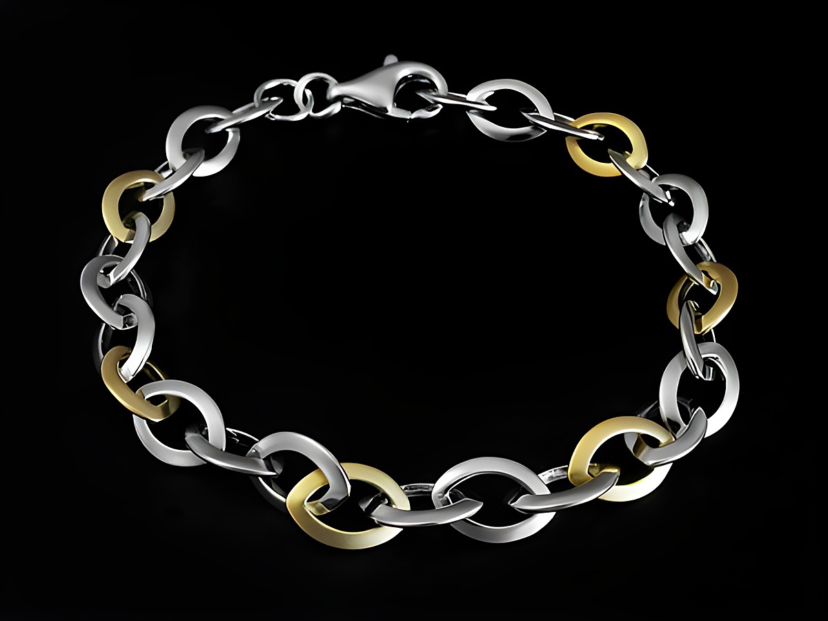 Armband Weitanker in Silber bicolor mit mattierten, vergoldeten Elementen, 19 cm lang, ohne Stein, Hersteller Juwelier Harnisch.